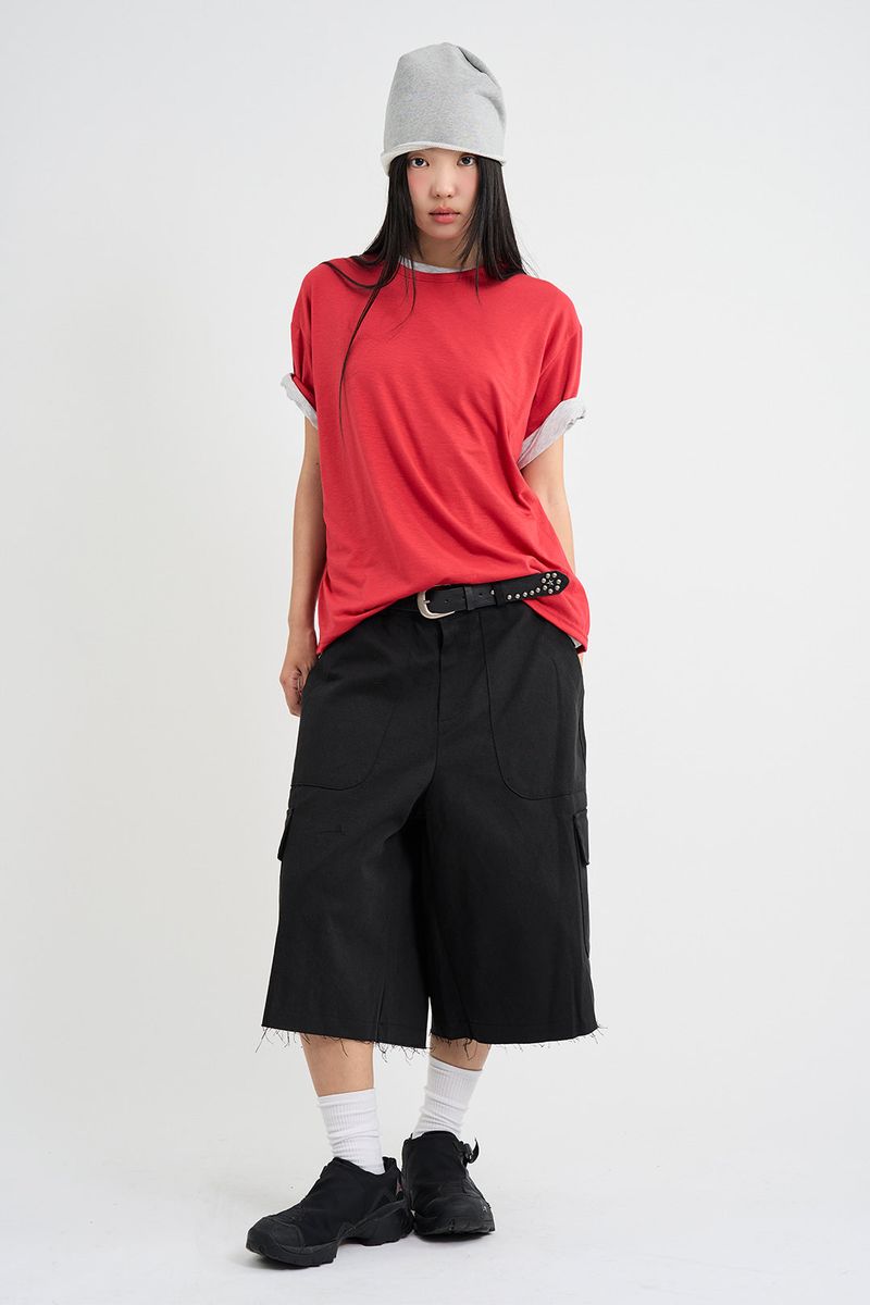 Rough-cut Bermuda shorts