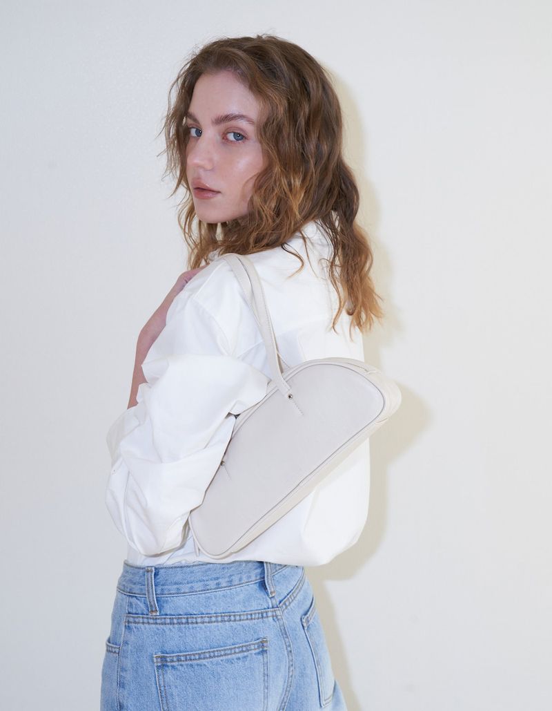 SOMEWHERE BUTTER（サムウェアーバター）の「demi baguette bag - butter cream（Bags）」