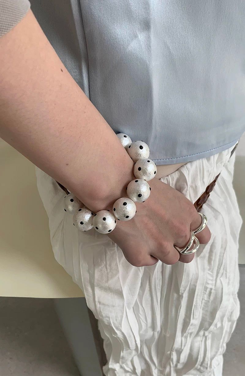 Matt white dot bangle
