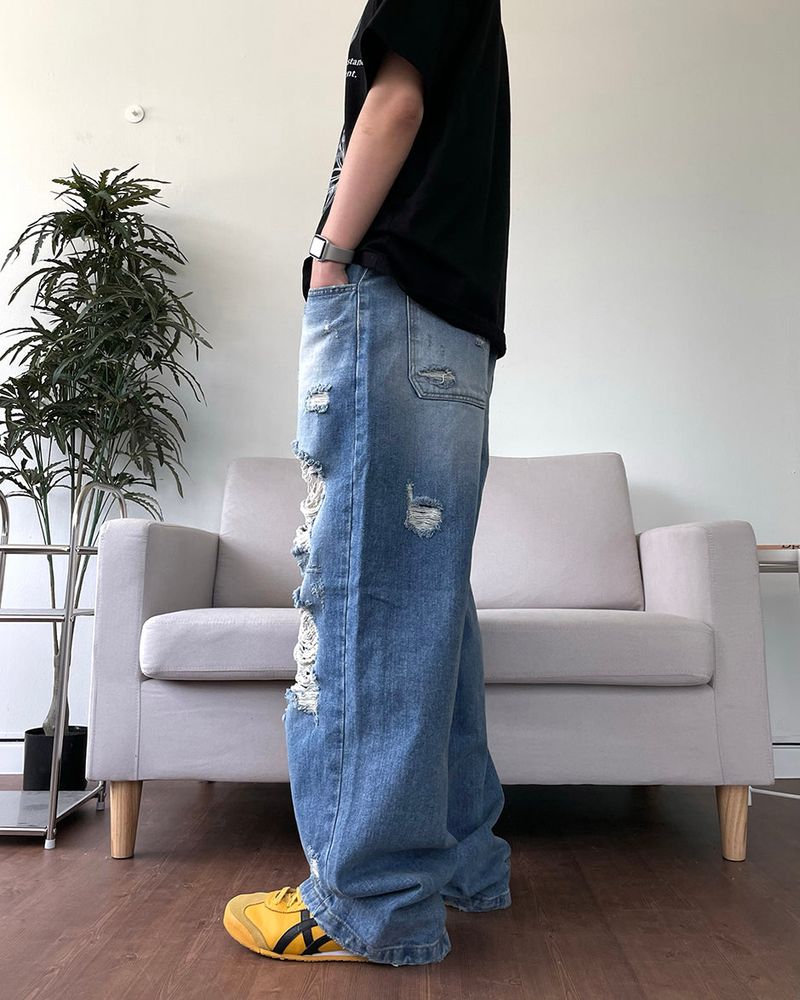 Destroyed brush denim pants