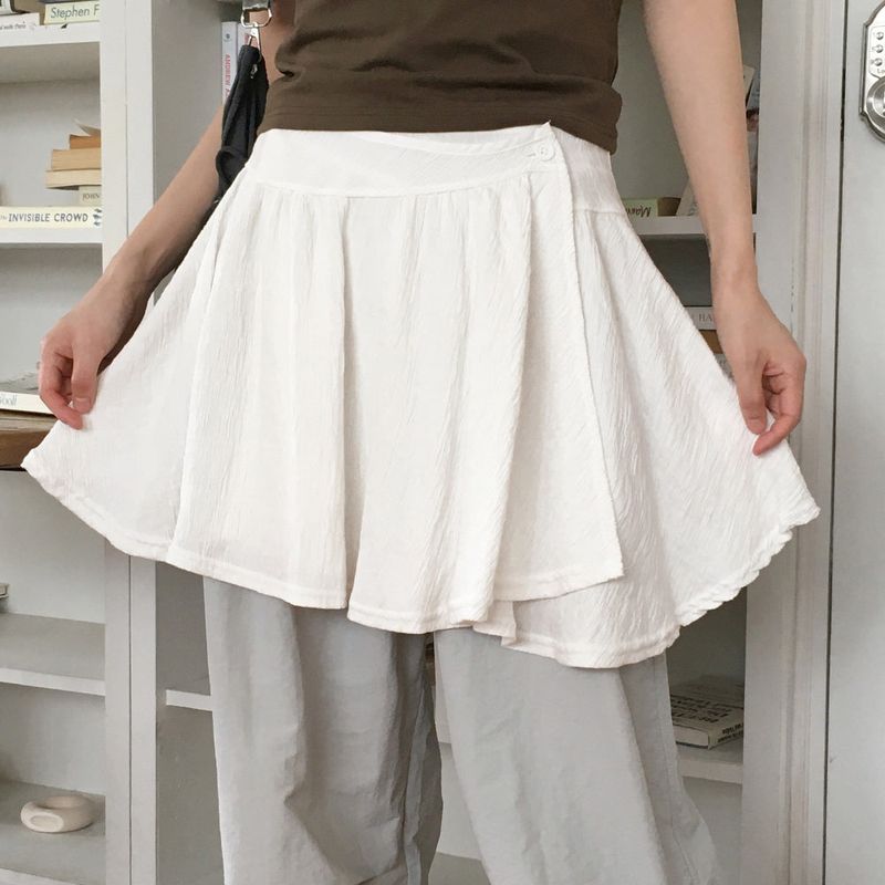 WONDER WONDER(ワンダーワンダー)の「Renka wrap button mini skirt(Skirts)」