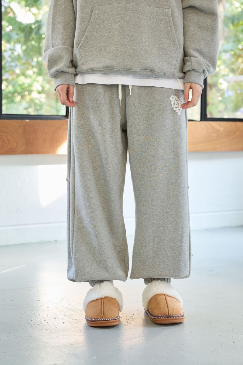 ARIKIM（アリキム）の「GOODLUCK HEART SNAP OFF SWEAT PANTS / MELANGE（Pants）」