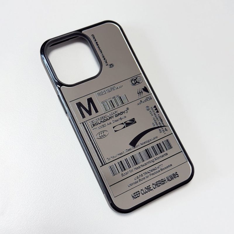 MEMORIESBOUNDARY（メモリーズバウンダリー）の「Fresh Love Delivery Label Bumper Mirror Phone Case (BK)（Smartphone Accessories）」