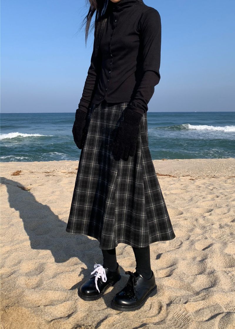A BLACK CHECK SKIRT