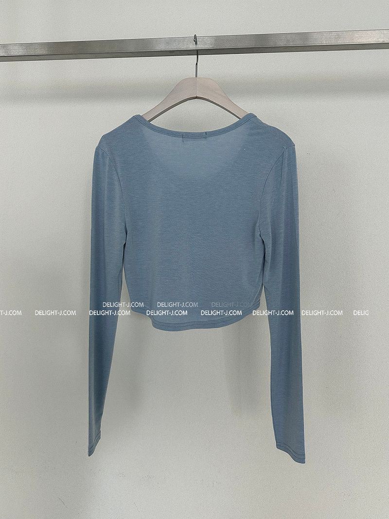 It's soft. A long-sleeved cropped shirt
