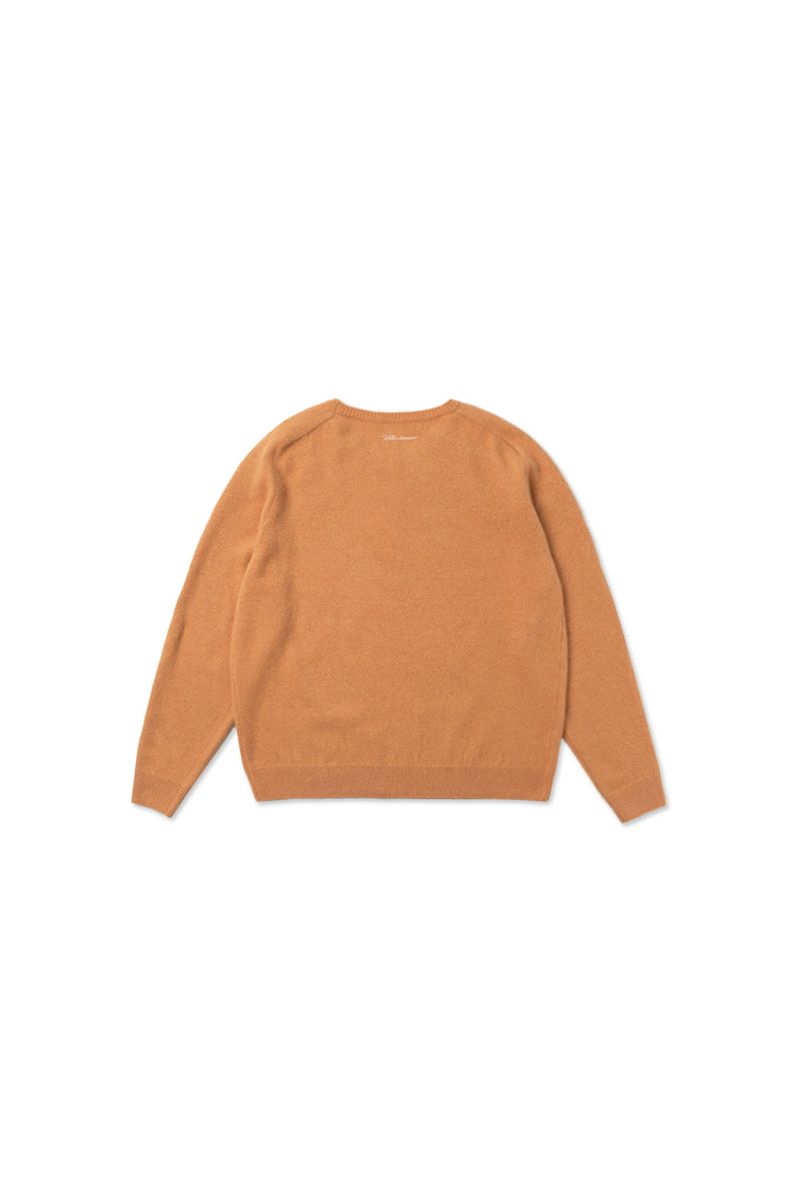 Cuddle raccoon knit_orange