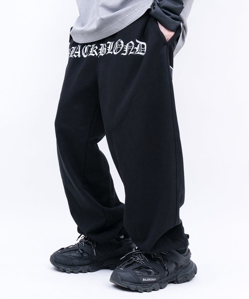 BLACKBLOND（ブラックブロンド）の「BBD クラッシュフェイス スウェットパンツ (ブラック)（パンツ）」