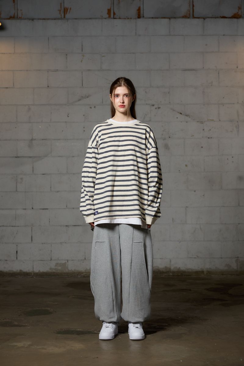 ARIKIM（アリキム）の「JERRY STRIPE OVERFIT LONG SLEEVE T-SHIRT / IVORY（Tops）」