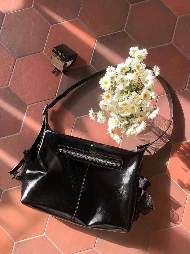 ovuni（オーブニ）の「Pillow ribbon bag_black（Bags）」
