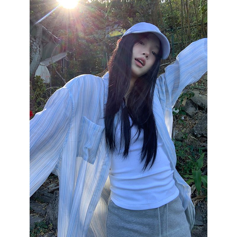 dereborujo（ドレボルゾー）の「blue striped sun-cut loose-fit shirt（Tops）」