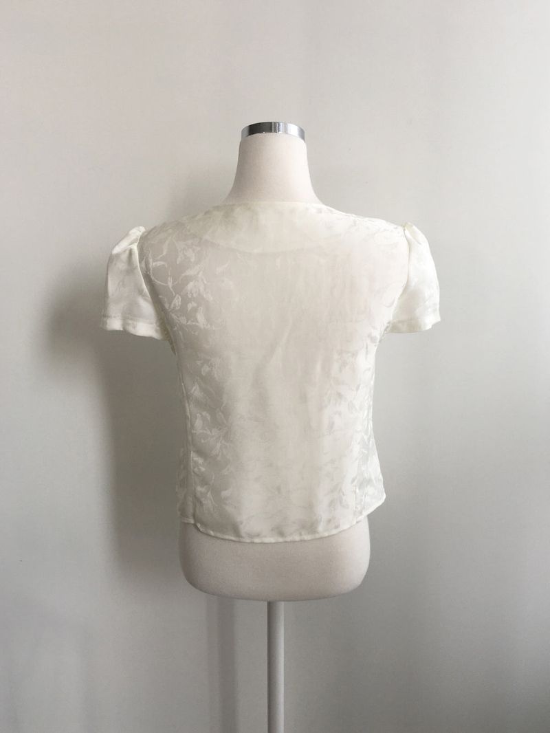 Jacquard tie puff blouse