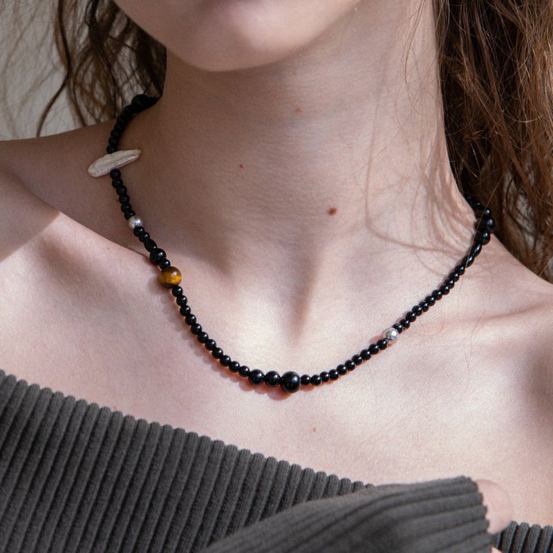 MerryMotive(メリーモチーブ)の「Black onyx and brown gemstone necklace(Accessories)」