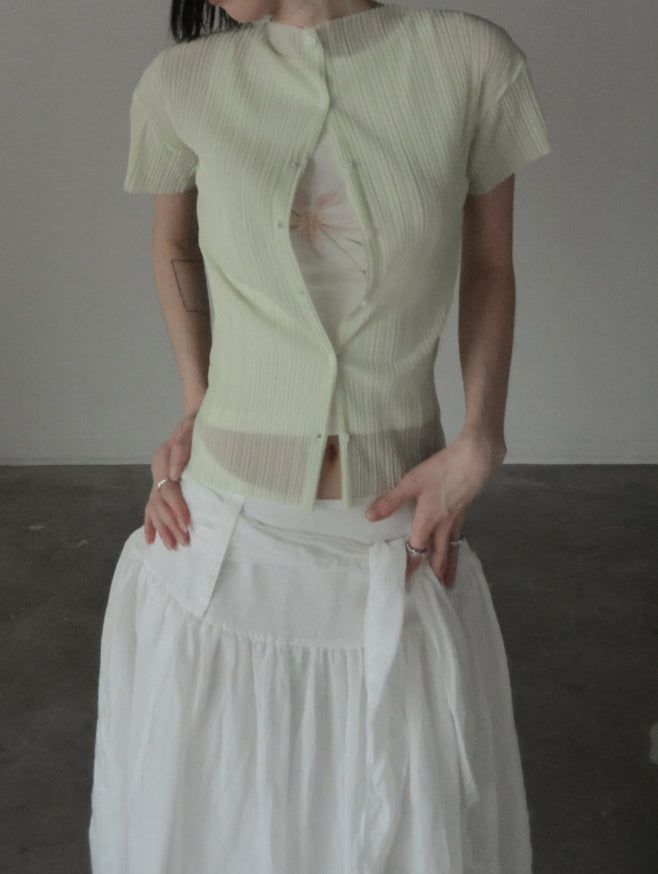 mnem（ムネム）の「Ellen Sheer Pleated Cardigan（Tops）」