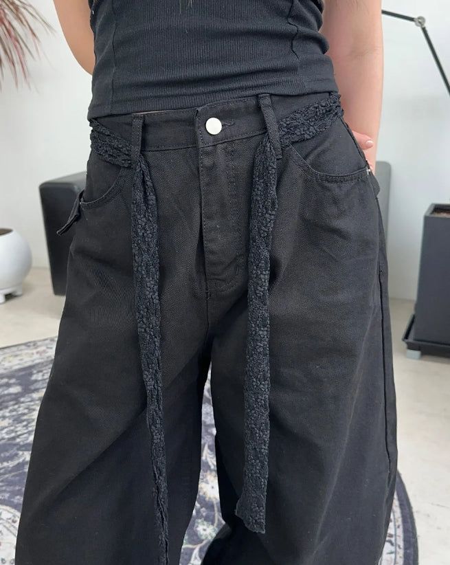Pale studded strap pants