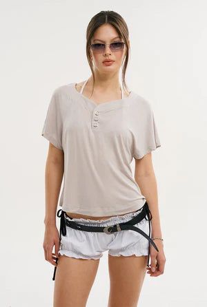 threetimes(スリータイムズ)の「Loose snap tee(Tops)」