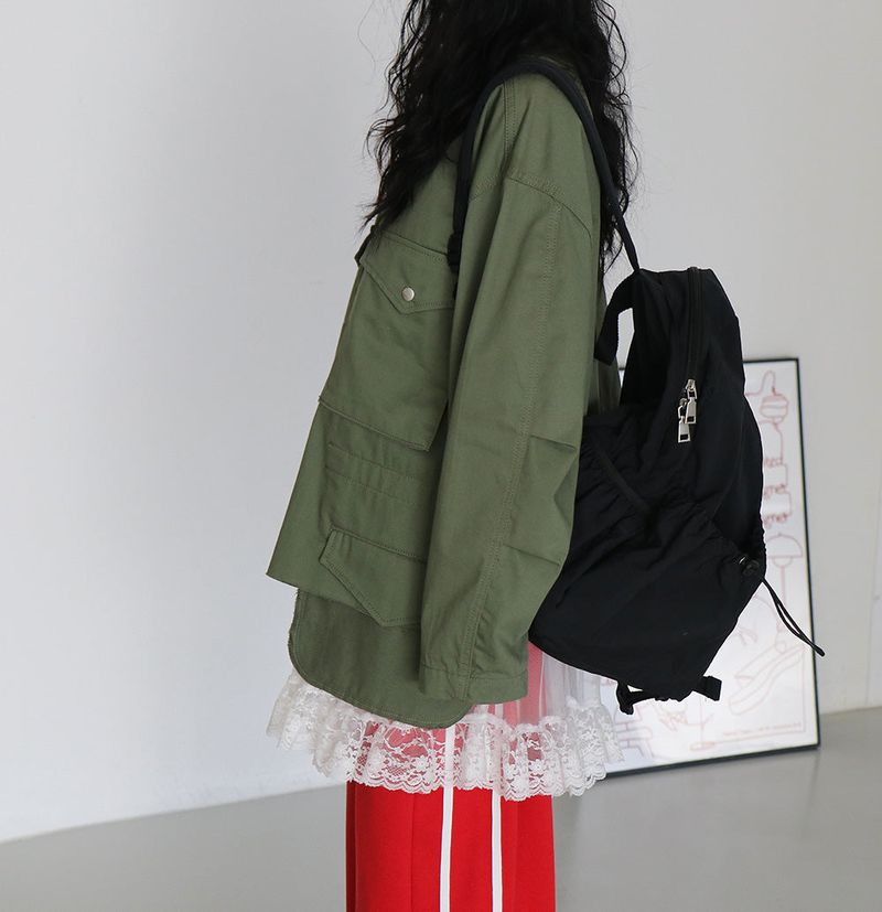 a ribbon-punching sleeveless shirt