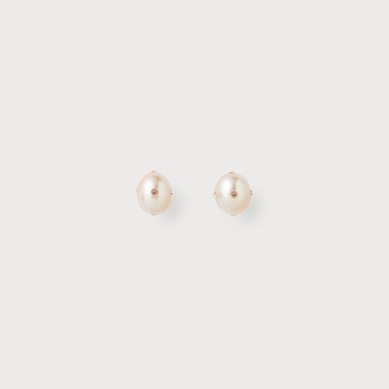 PEARLSONATE（パーソネイト）の「ポルカドッツイヤリング　ピーチ（アクセサリー）」