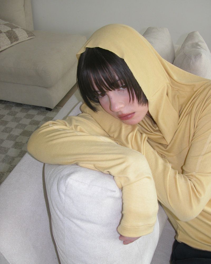 SEASEE(シーシー)の「Veggie Turtleneck Hoodie, Yellow(Tops)」