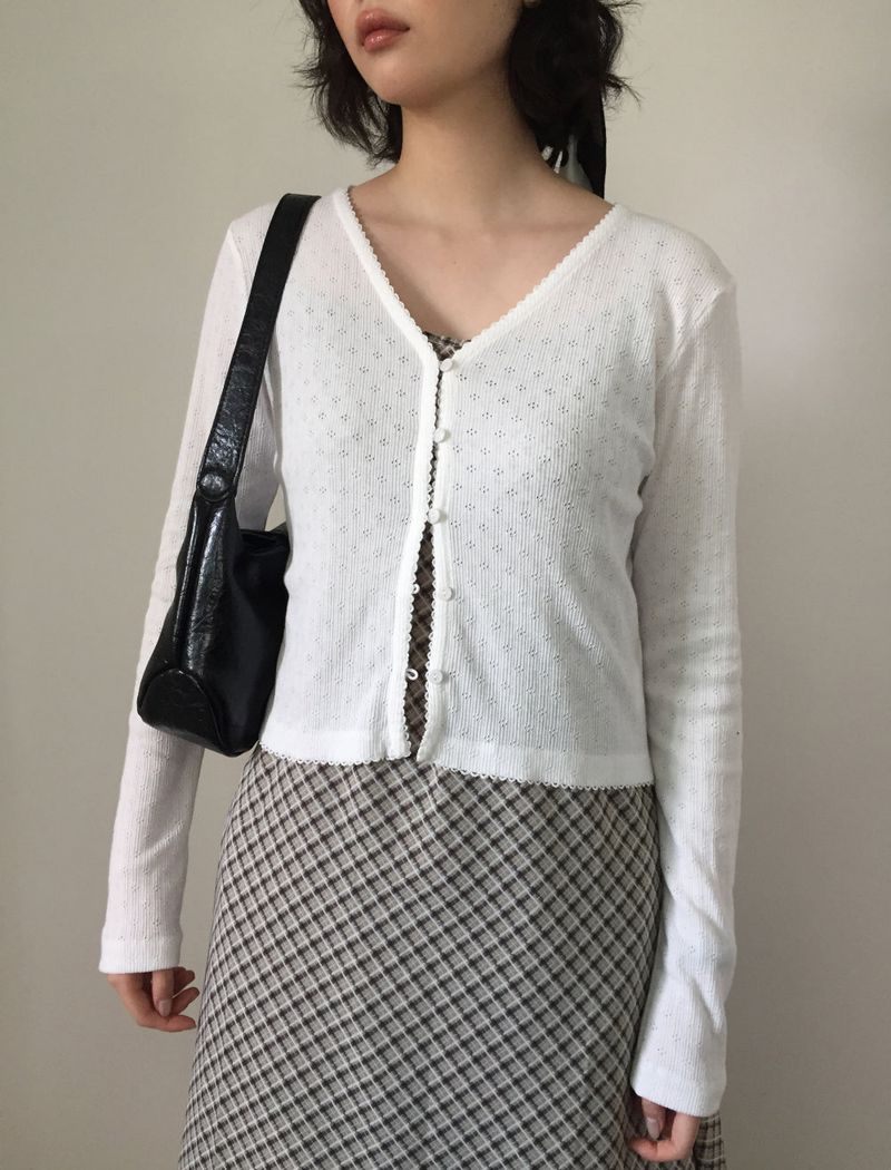 DUGGY(ダギー)の「Vertical punching v-neck cardigan (4color)(Tops)」