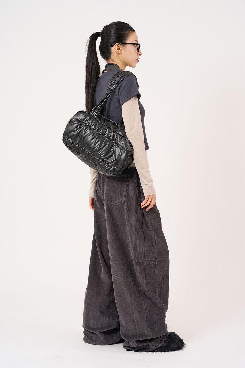 Padded glossy leather shoulder bag