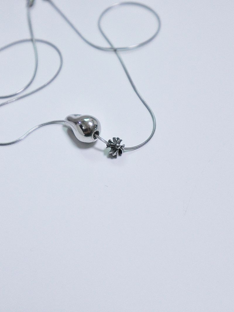 All surgical steel object cross necklace