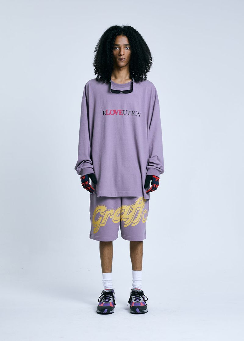 GRAFFITIONMIND（グラフィティオンマインド）の「RLOVEUTION LONG SLEEVE T-SHIRT_PURPLE（Tops）」