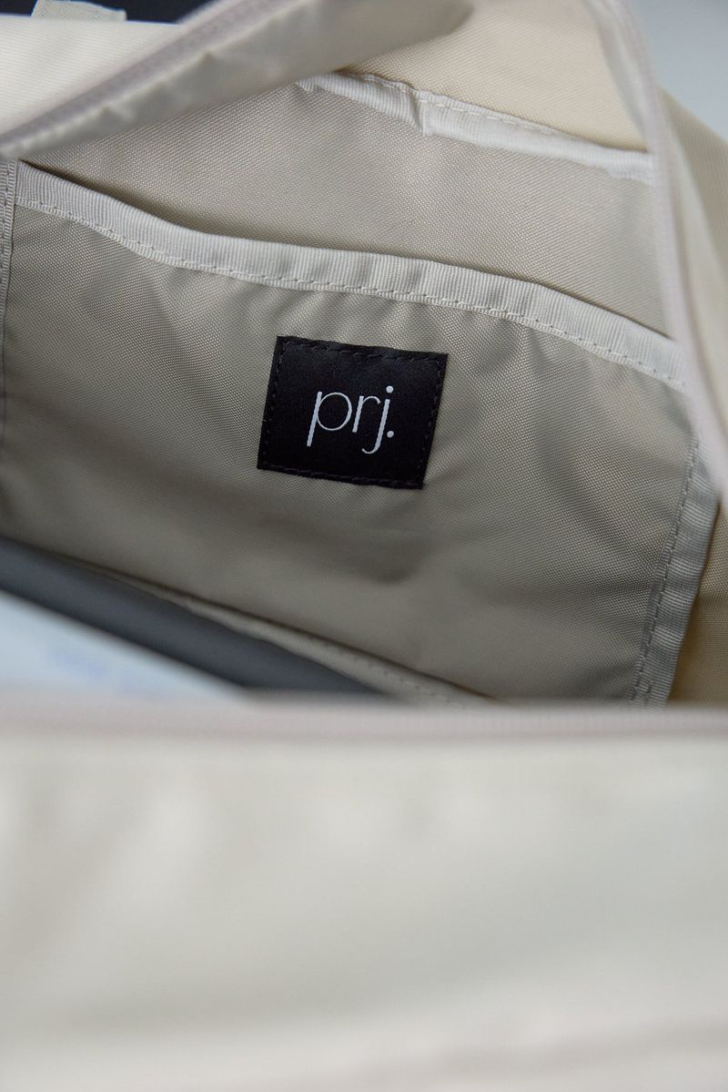 compact duffle bag (light beige)
