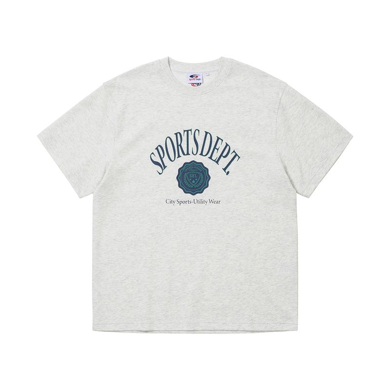 FCMM（エフシーエムエム）の「Sports Dept SEL College T-shirt - Oatmeal（Tops）」