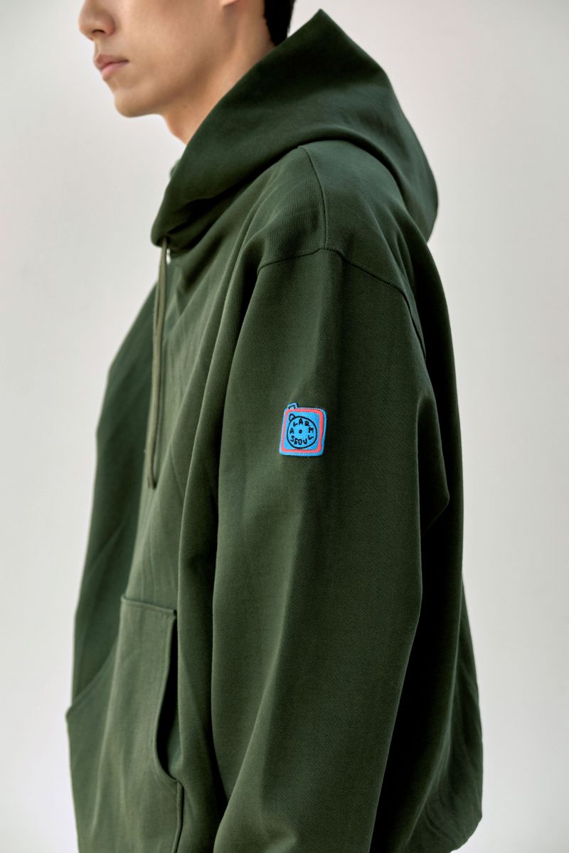 ALARMSEOUL(アラームソウル)の「ALARM OVERFIT HOODIE GREEN_UNISEX(Tops)」