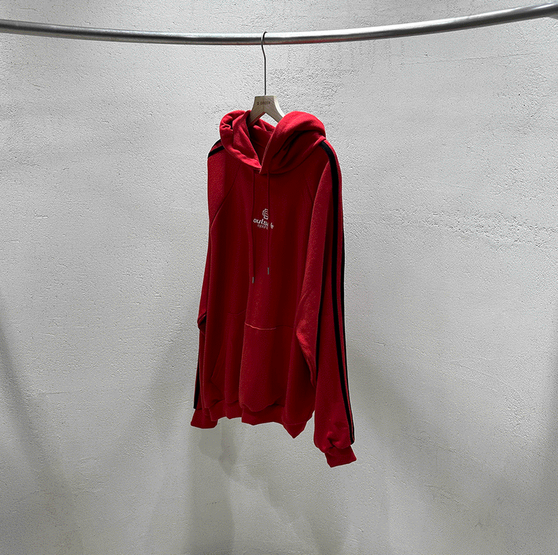 Outside track over hoodie