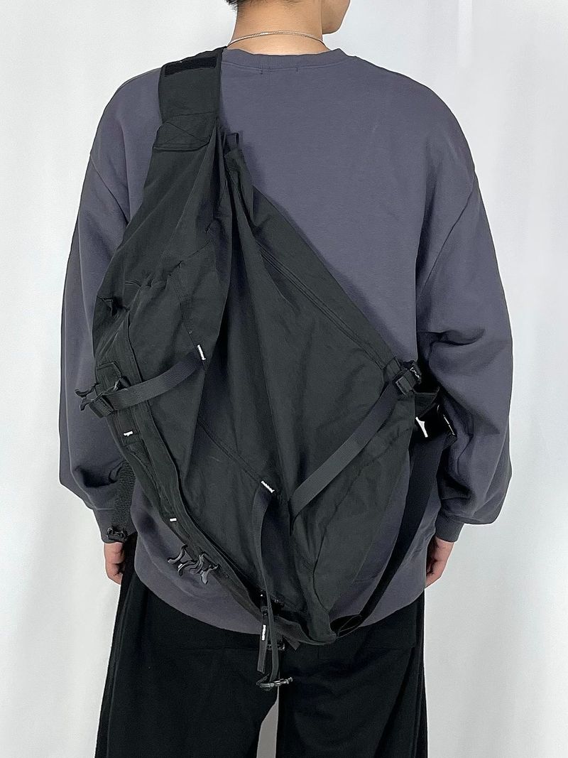 Velcro over sling-bag