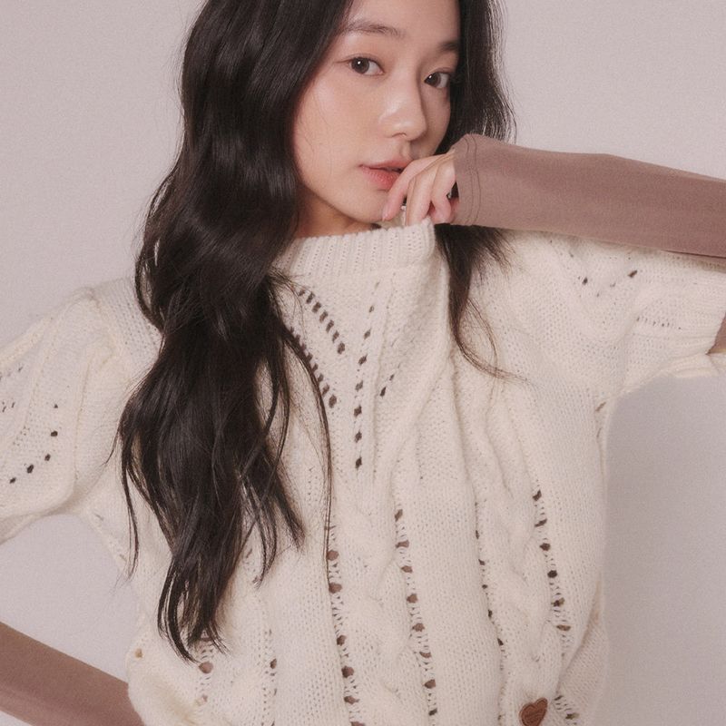 mellotory（メロートリー）の「CABLE KNIT SHORT-SLEEVED TOP (IVORY)（Tops）」