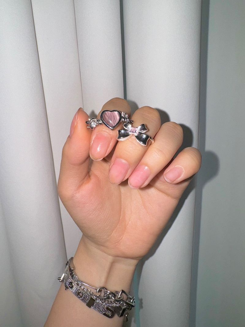 Pink heart angel ring