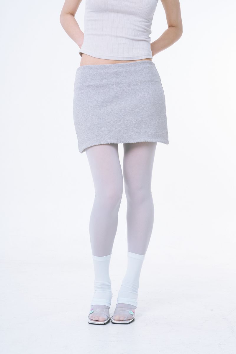 Innermuseum（インナーミュージアム）の「カーブドレーストリムミニスカート (MELANGE GREY)（スカート）」