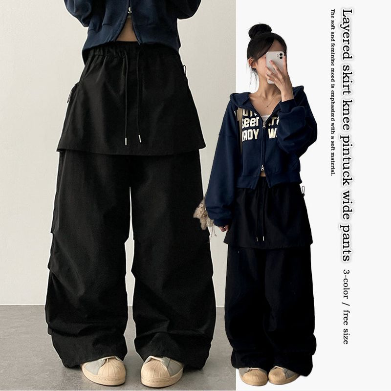Log banding layered pocket skirt pants