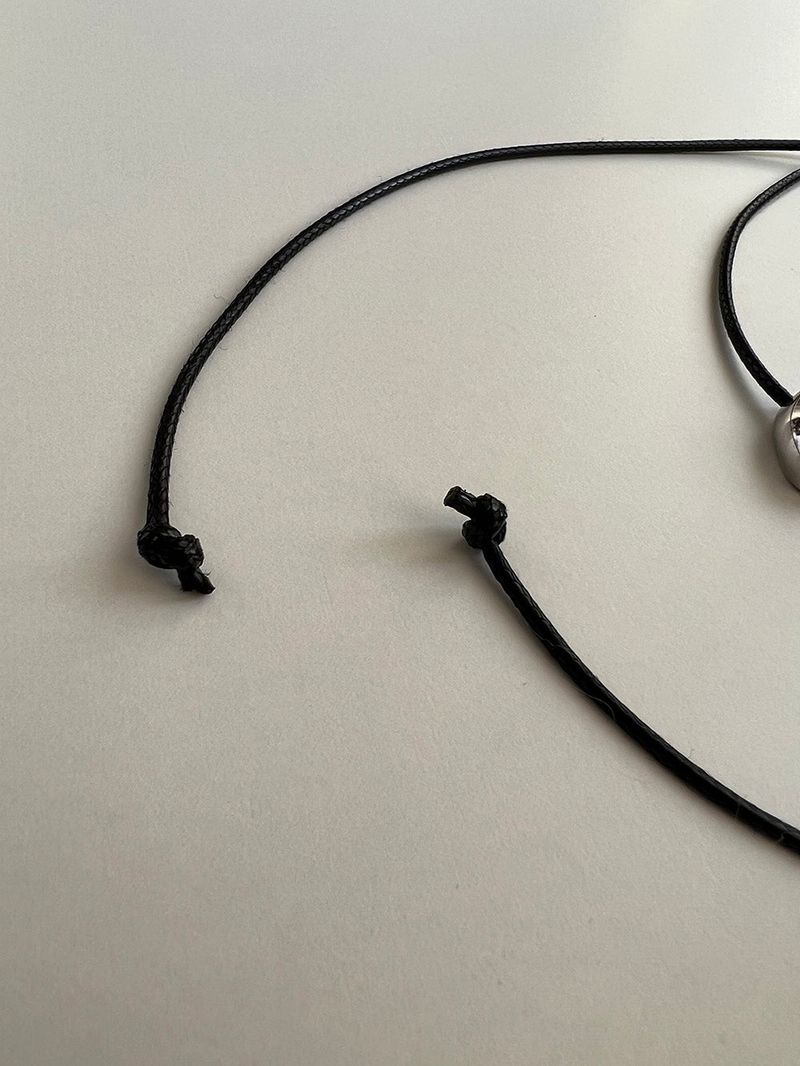 String heart necklace
