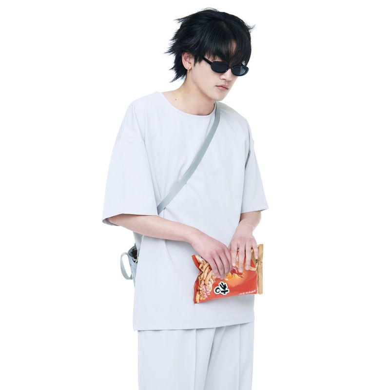 C Wear by the Genius(シーウェア バイザジーニアス)の「WOVEN 1/2 HALF T-SHIRT COOL GREY(Tops)」