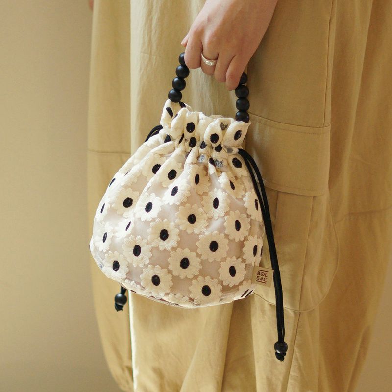 BOLSAC（ボルサック）の「poppy bucket bag_white flower（Bags）」