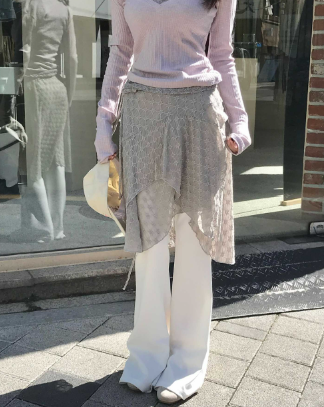 cloudemotion（クラウドエモーション）の「lily asymmetric drop midi wrap sk（Skirts）」