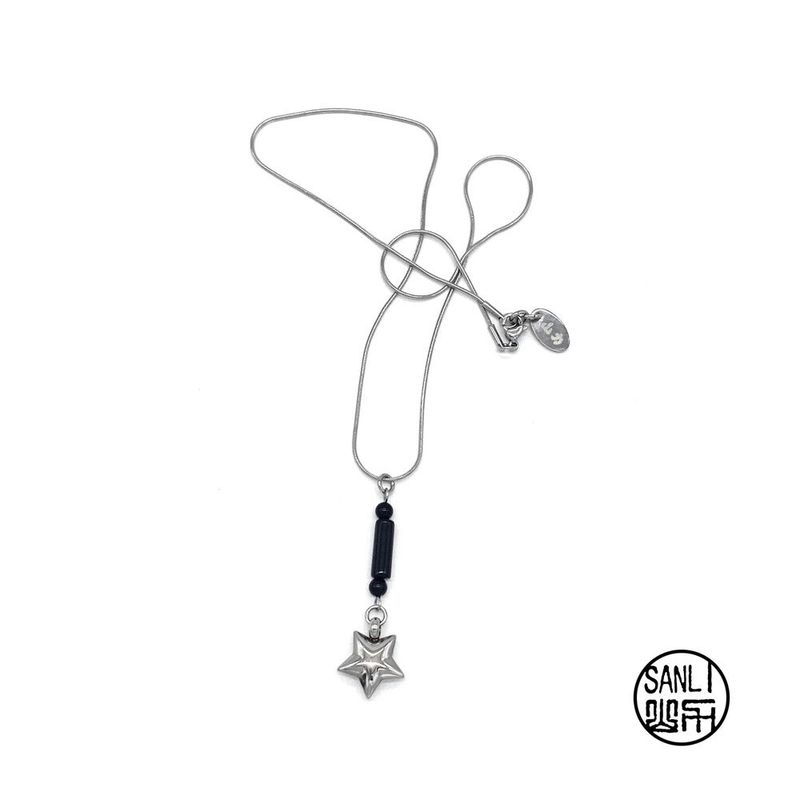 Black drop-star necklace