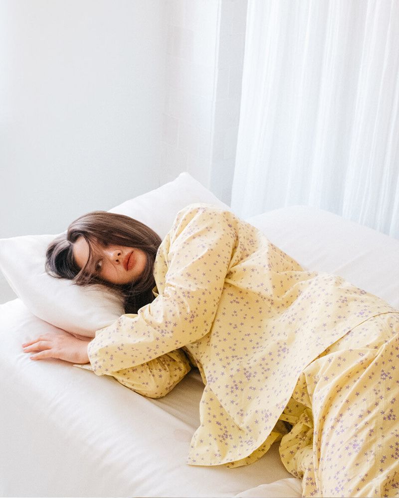 Artiv（アーティブ）の「スターパターンパジャマセット (yellow)（セットアップ）」