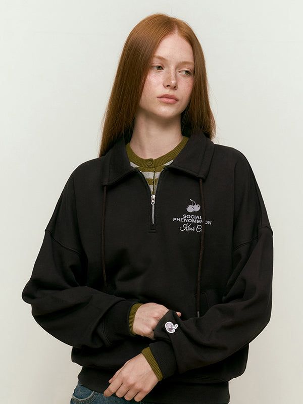 KIRSH（キルシー）の「CHERRY ARCH LOGO HALF ZIP UP [DARK BROWN]（Tops）」