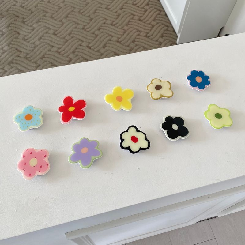 jjehouse（ジェイジェイハウス）の「フラワー柄グリップトック（スマホグッズ/小物）」