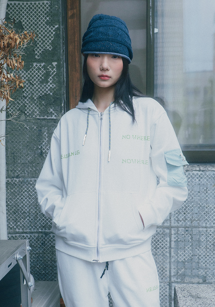 Heisan(ハイサン)の「Nowhere Sweat Hood Zip-Up White(Tops)」