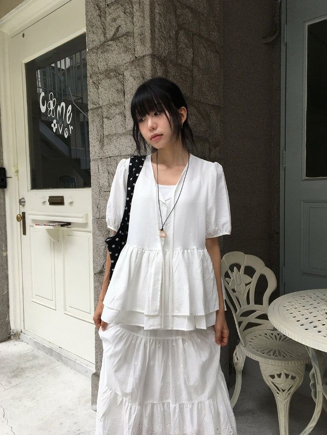 BAON（バオン）の「ポンボ ティアード フリル オーバーフィット ショート スリーブ パフ ブラウス（トップス）」