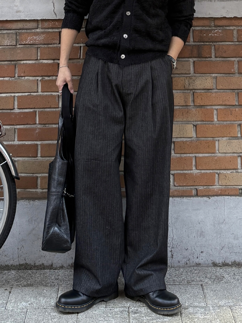 AVAND（アバンド）の「ポーターヘリンボーンデニムスラックス（パンツ）」