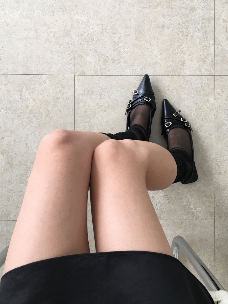 Twist belt slingback flat