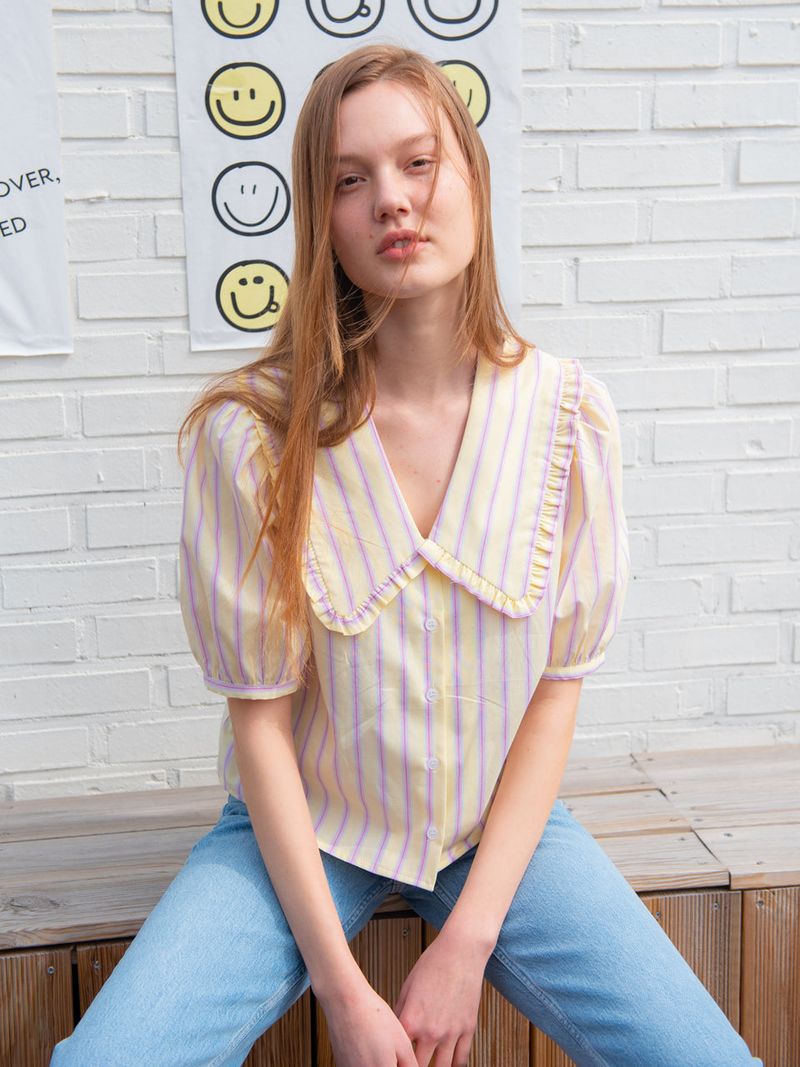 vem.ver(ベムバー)の「STRIPE RUFFLE COLLAR BLOUSE_YELLOW(Tops)」