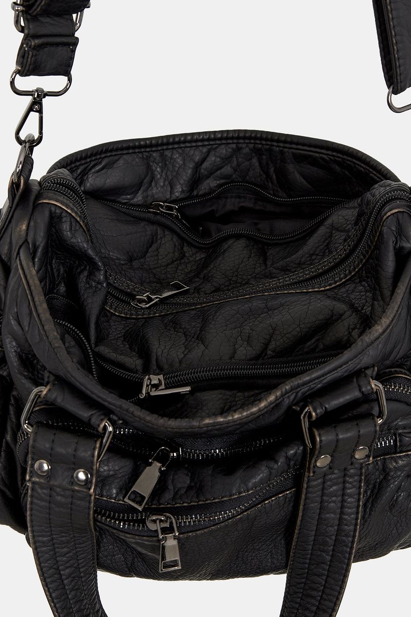 Old vintage multi-pocket leather bag