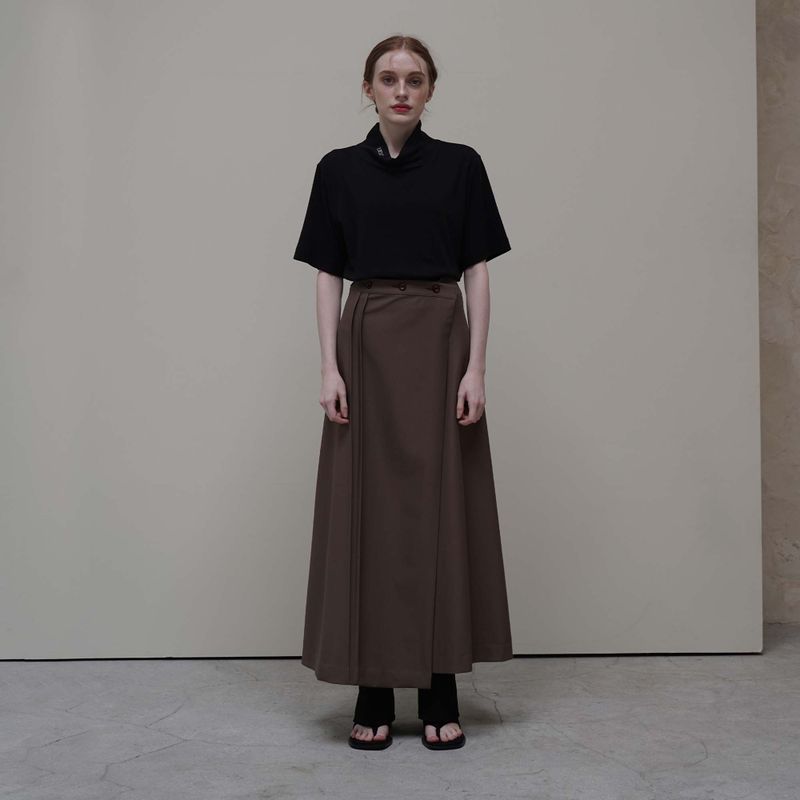 UBEIGE（ユーベイジ）の「Brown Long Wrap Skirts（Skirts）」